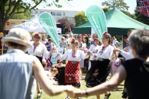 Kitka performing at the Festival dancing with members of the audience