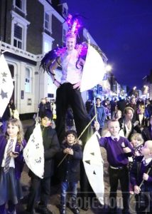 Pupils from Our Lady Hartley School with Will the Stilt Walker